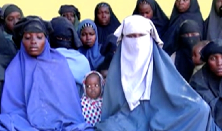 Nigerian soldiers on patrol find one of school girls abducted by Boko Haram 8 years ago