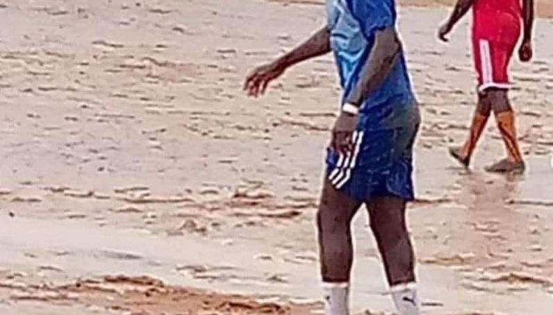 Back to the Roots: Liverpool star Sadio Mane joins friends for a football match in muddy village ground in Senegal