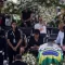 Final bow…King Pele laid to rest by thousands of fans who queued on Sao Paulo streets to pay last respects