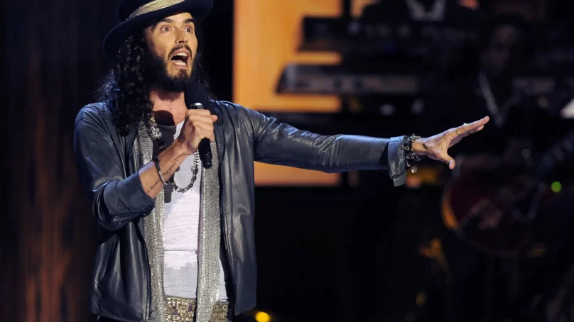Comedian Russell Brand denies he sexually assaulted women as reported in UK news outlets