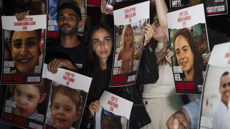 Egypt opens its border crossing to allow limited humanitarian aid reach besieged Gaza