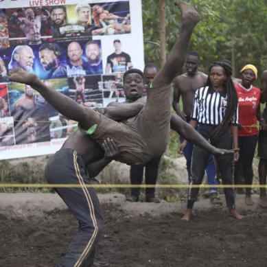Don’t try this at home: Why Ugandan teens wrestle in mud to try out skills picked from pro-wrestling on TV at home