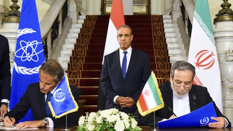 Iran and Atomic Energy Agency sign agreement to restart cooperation, but doubts persist