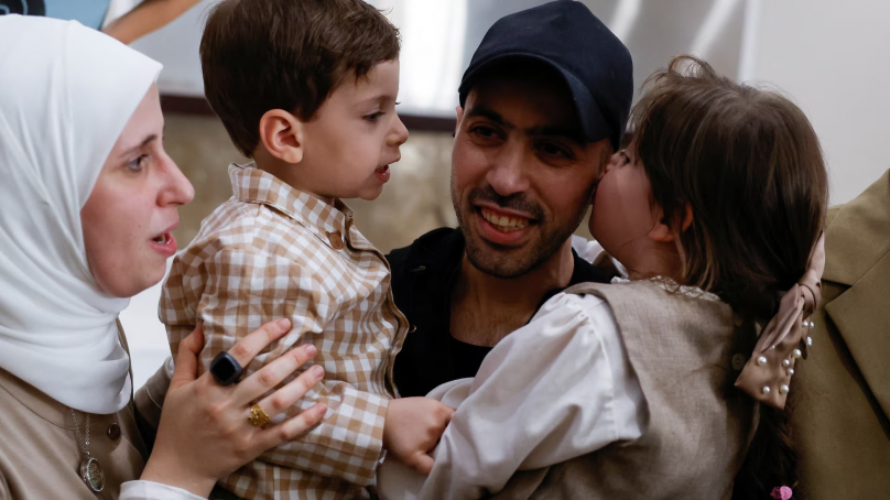 Freed Palestinians prisoners, some in Israeli jails for 20 years, arrive home in Gaza under ceasefire deal