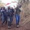 Mourners in central Kenya carry casket on shoulders after heavy rains render road impassable