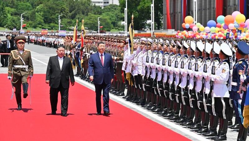 Chinese President Xi Jinping meets North Korean counterpart Kim Jong Un in Pyongyang to discuss economic ties
