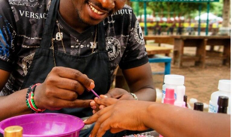 Pushing boundaries: How Kisumu male nail artist overcame cultural and social hang-ups to maintain steady stream of female clients
